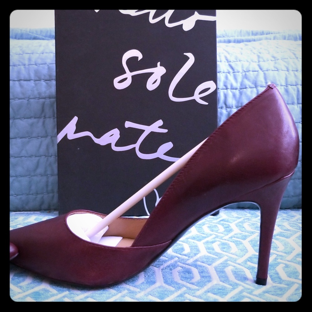 Black rose Dorsay heels.